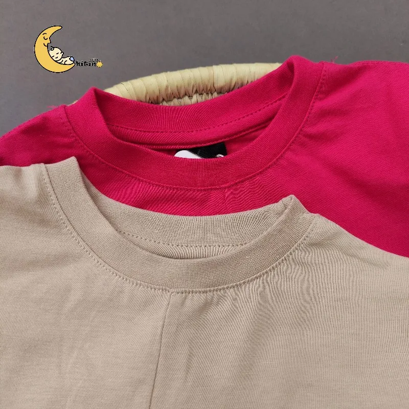 تیشرت کراپ گره ای آکو برای کودکان 2 تا 9 سال در رنگهای سرخابی و کرم