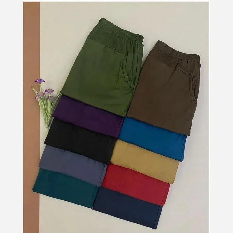 شلوار راحتی زنانه اسلش طرح گیاهی وارداتی قواره آزاد مچ دار سایز بزرگ