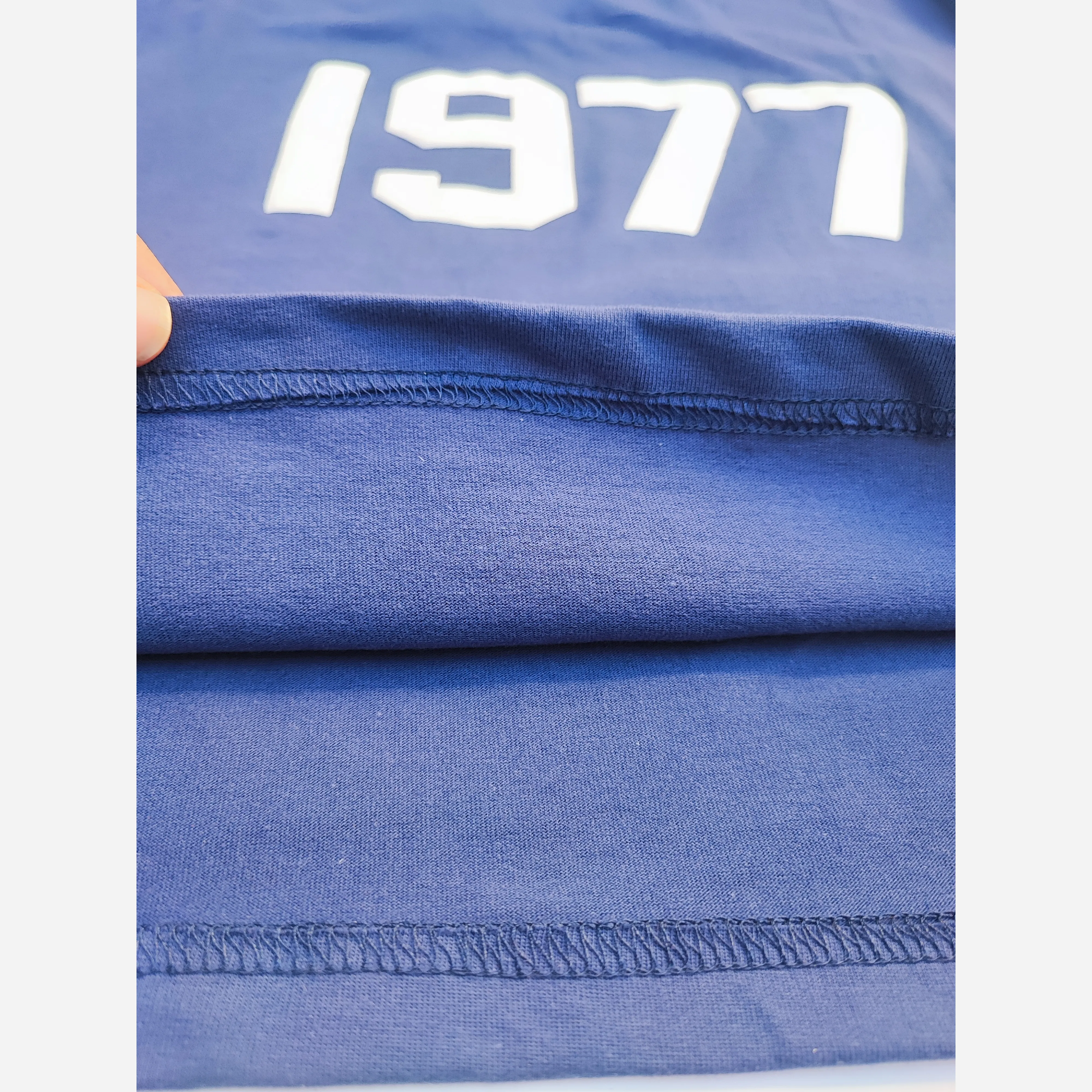 ست تیشرت و شلوارک اسپرت پسرانه و دخترانه طرح 1977 رنگ سرمه ای سایز 55 تا 75